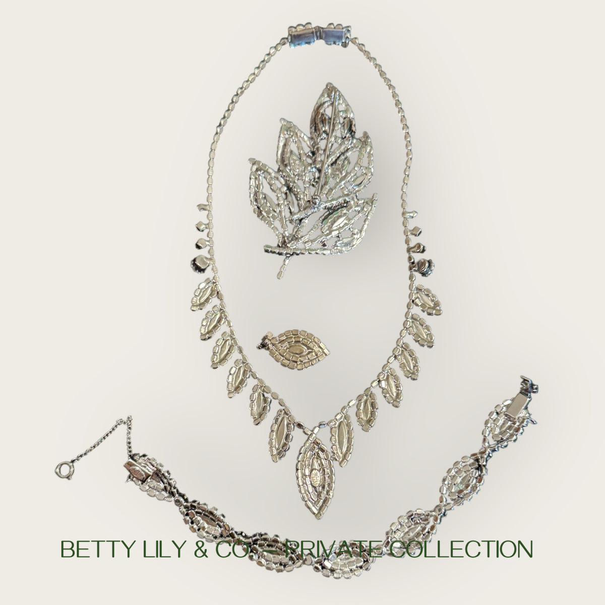 Signed Weiss Emerald Green Navette Rhinestone Parure | Necklace, Bracelet & Brooch | Mid-Century Collector’s Masterpiece | Private Collection