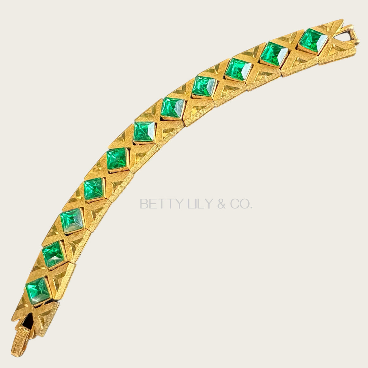 Vintage Czech-Style Articulated Bracelet – Brushed Gold with Emerald Green Glass Stones