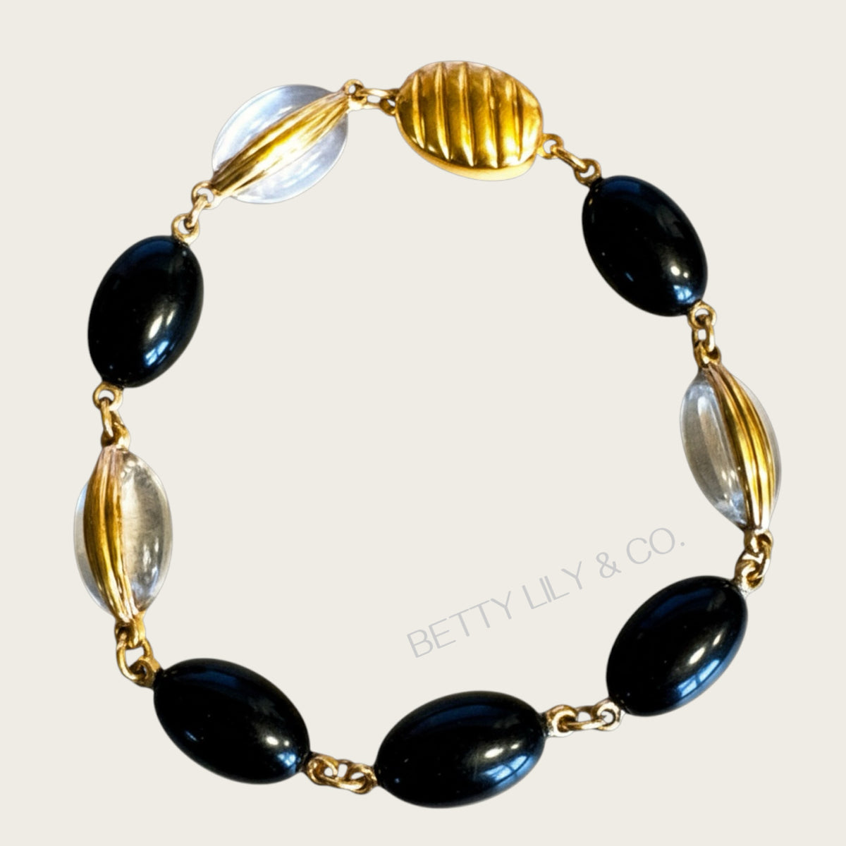 Vintage Swarovski Dove-Marked Crystal Cabochon Bracelet – Jet & Clear, Ribbed Gold Wrap Links