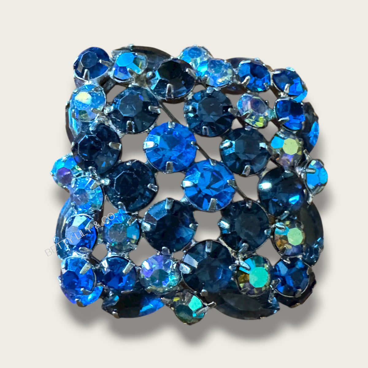 Vintage 1960s Sapphire Blue Aurora Borealis Domed Rhinestone Brooch – Layered Mid-Century Statement Pin in Silver-Tone