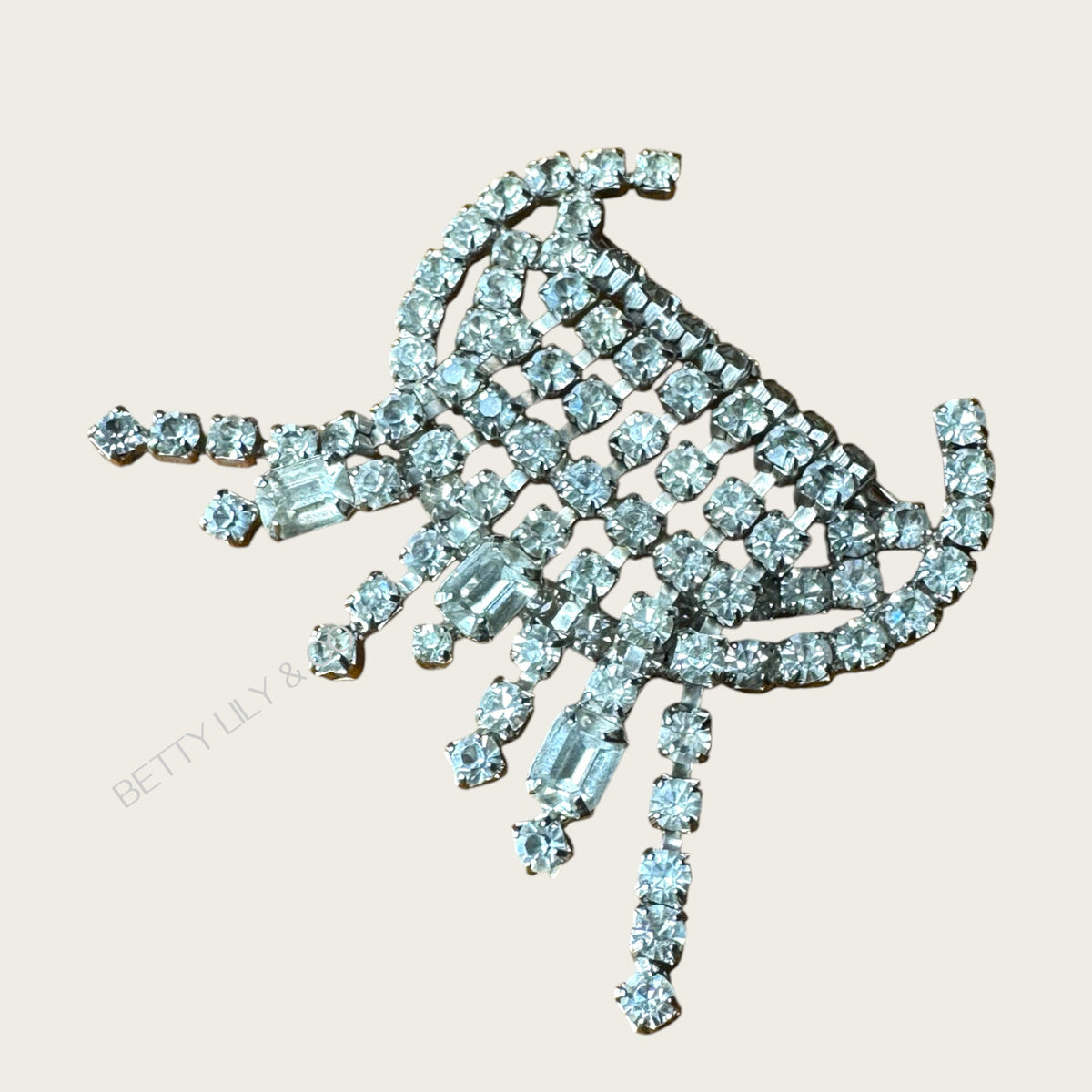 Vintage Art Deco Waterfall Rhinestone Brooch Silver Tone with Baguette & Round Stones – Draped Fringe Design (1940s–1950s)