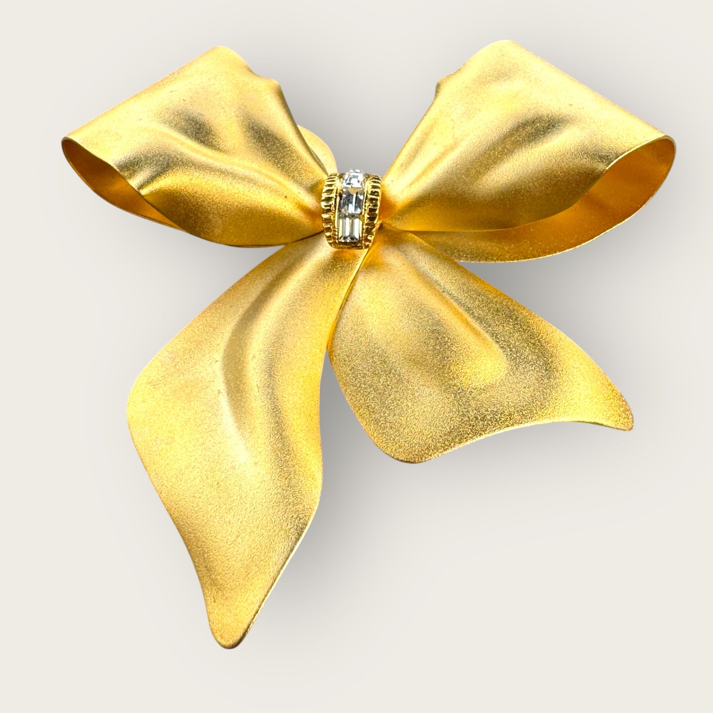 Vintage Gold-Tone Bow Brooch with Clear Rhinestones – Unsigned