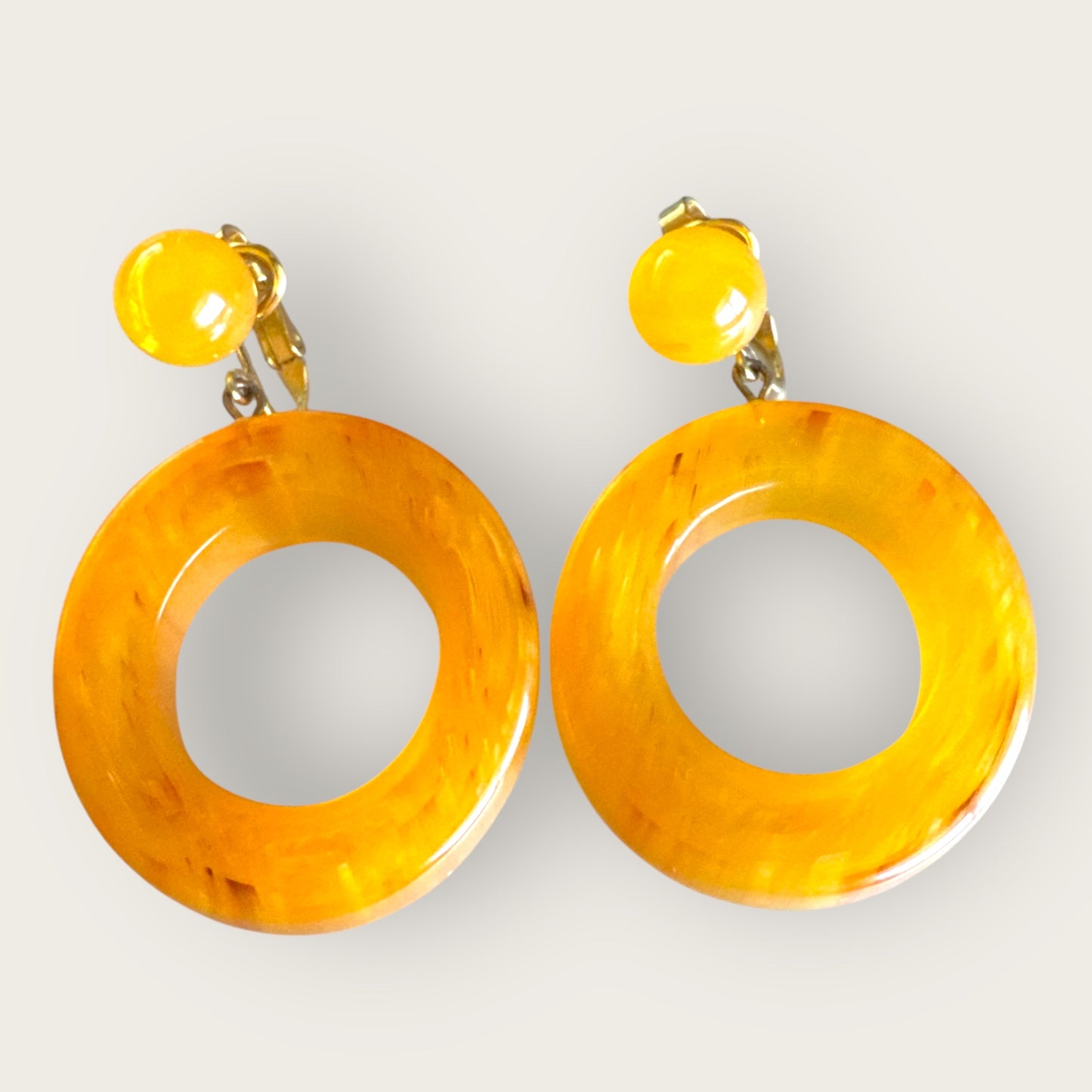 Vintage Crown Trifari Butterscotch Lucite Doorknocker Earrings – 1950s–1960s Statement Dangles