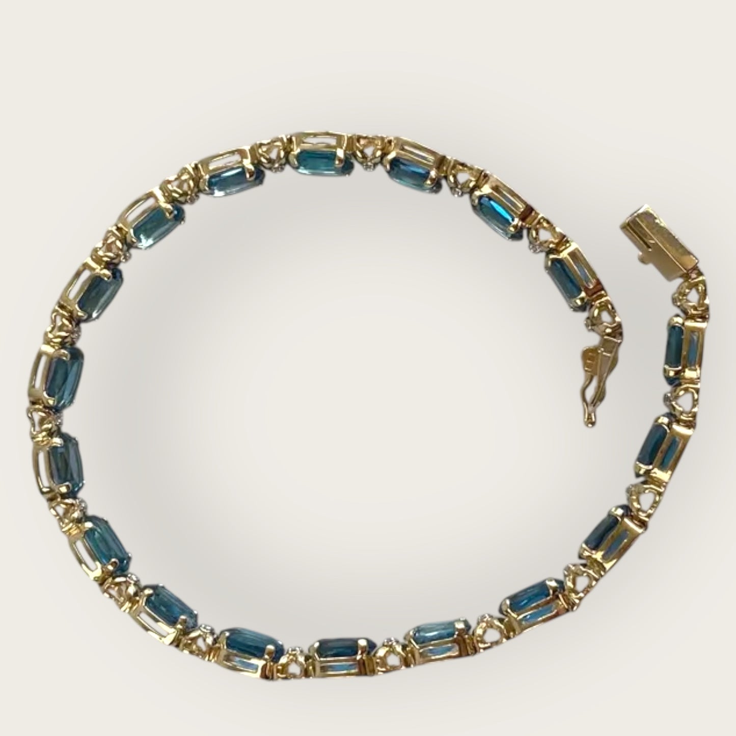 Vintage 14K Gold Blue Topaz and Diamond Tennis Bracelet – 8 Inch