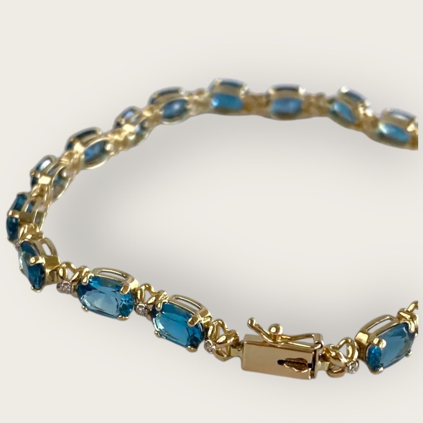 Vintage 14K Gold Blue Topaz and Diamond Tennis Bracelet – 8 Inch