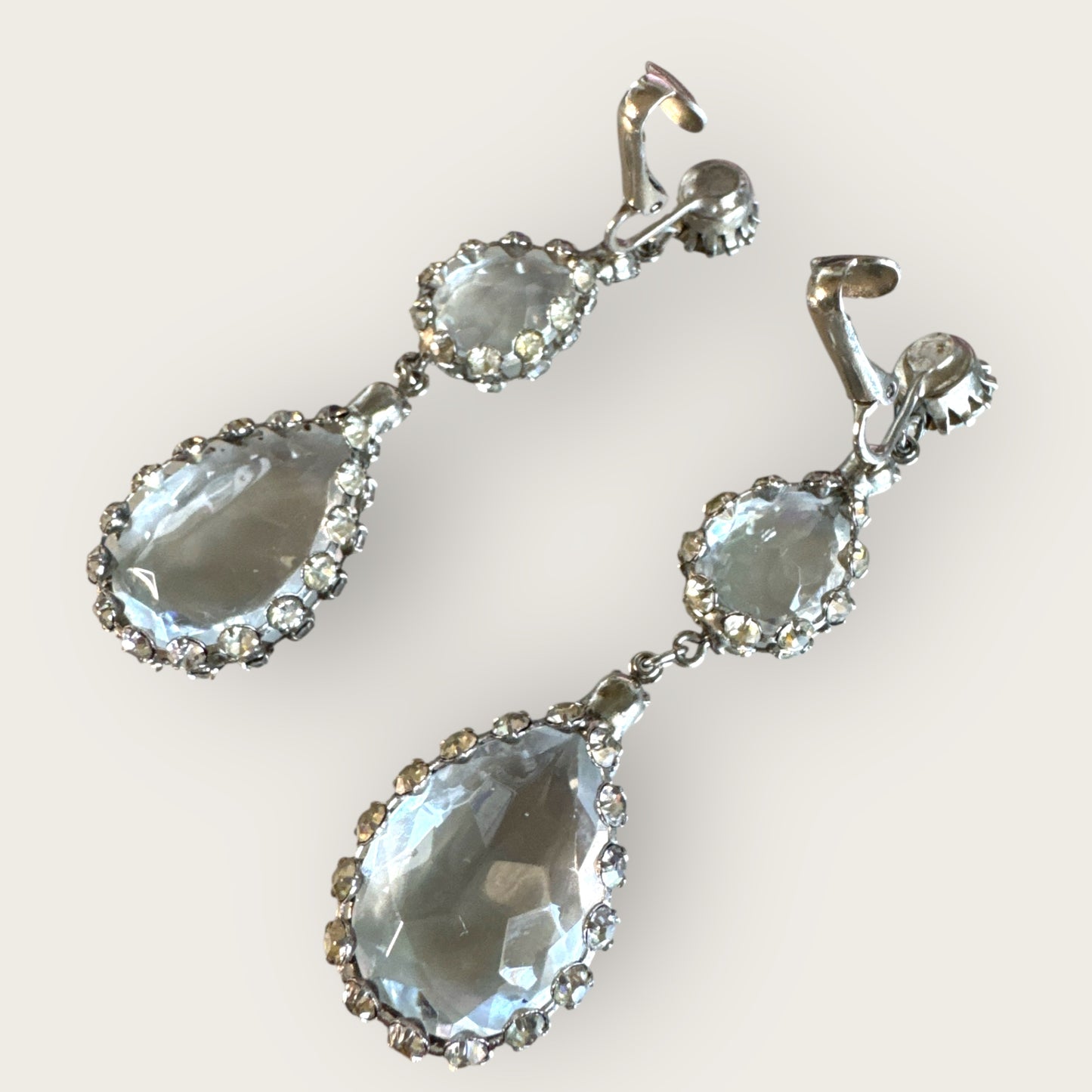 Silvertone Articulated Clip-On Teardrop Earrings with Framed Clear Rhinestones
