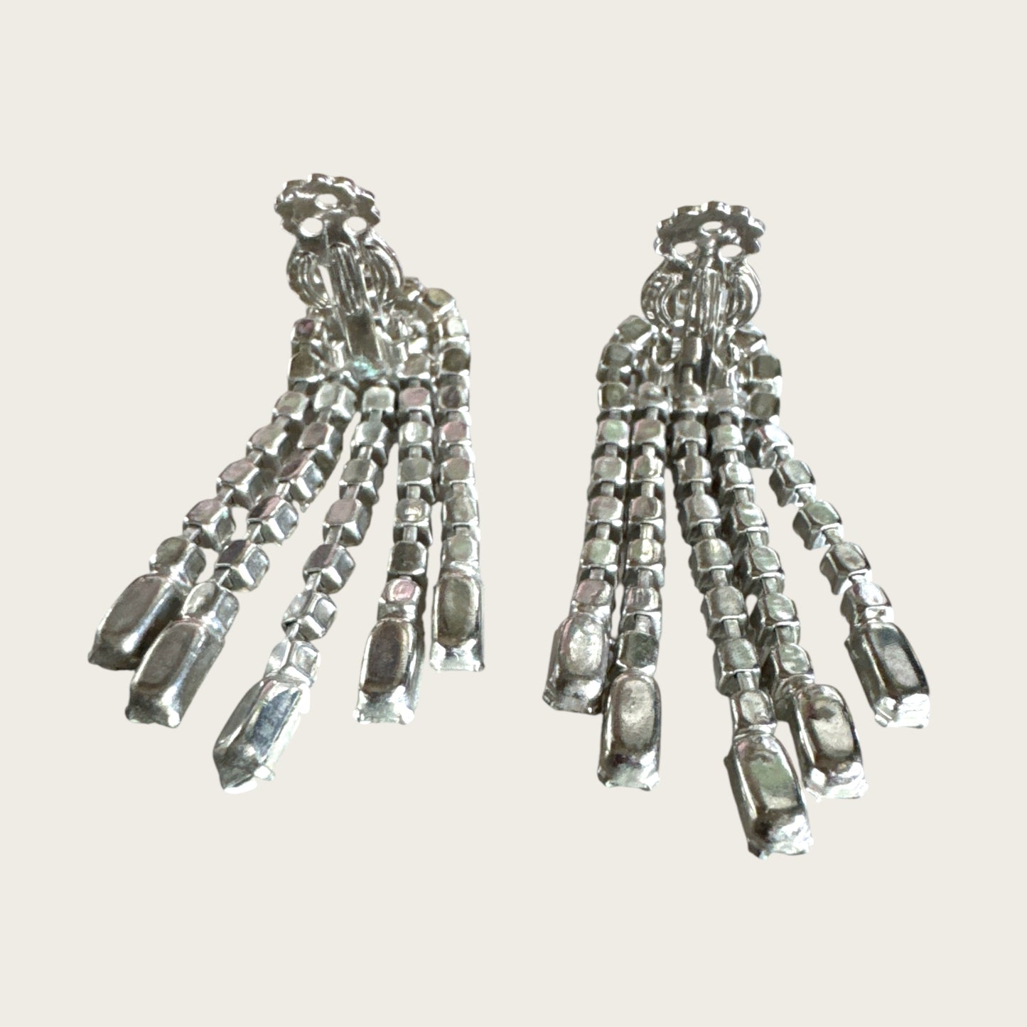 Vintage Riveted Florette Clip-On Earrings with Rhinestone Chain Dangles & Baguette Finishes – 1950s Mid Century Glamour