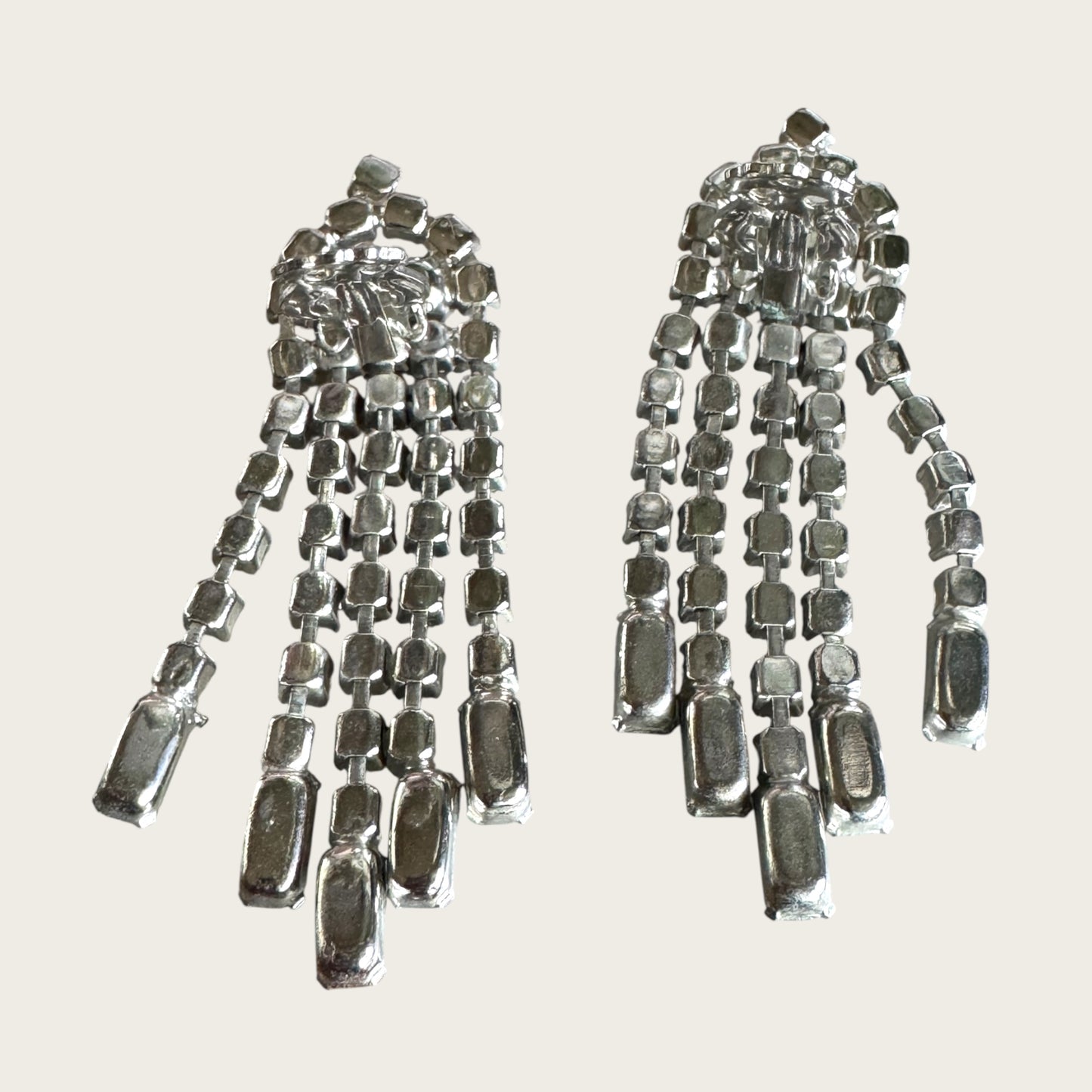 Vintage Riveted Florette Clip-On Earrings with Rhinestone Chain Dangles & Baguette Finishes – 1950s Mid Century Glamour