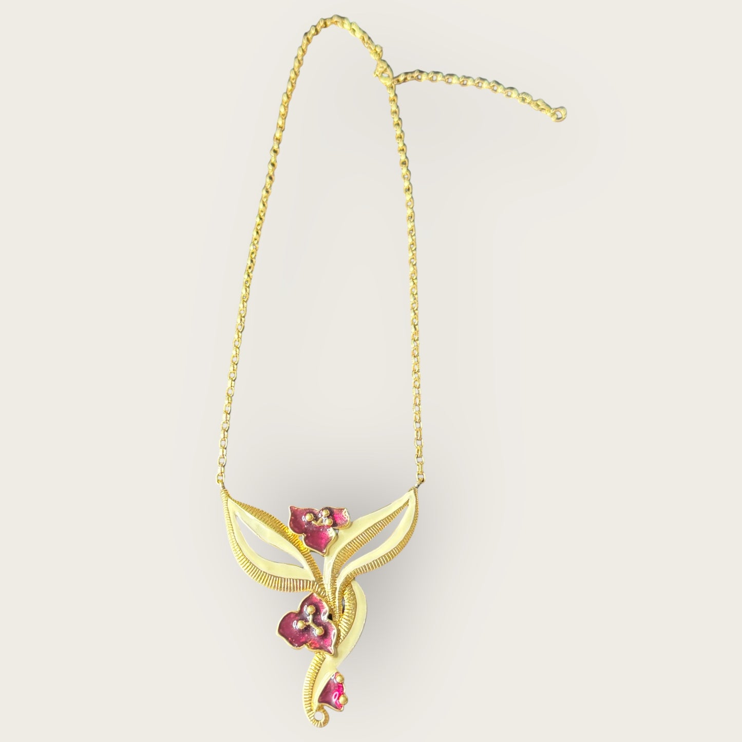 Vintage Signed Monet Floral Enamel Necklace – Gold-Tone Abstract Lily Design with Deep Magenta Accents