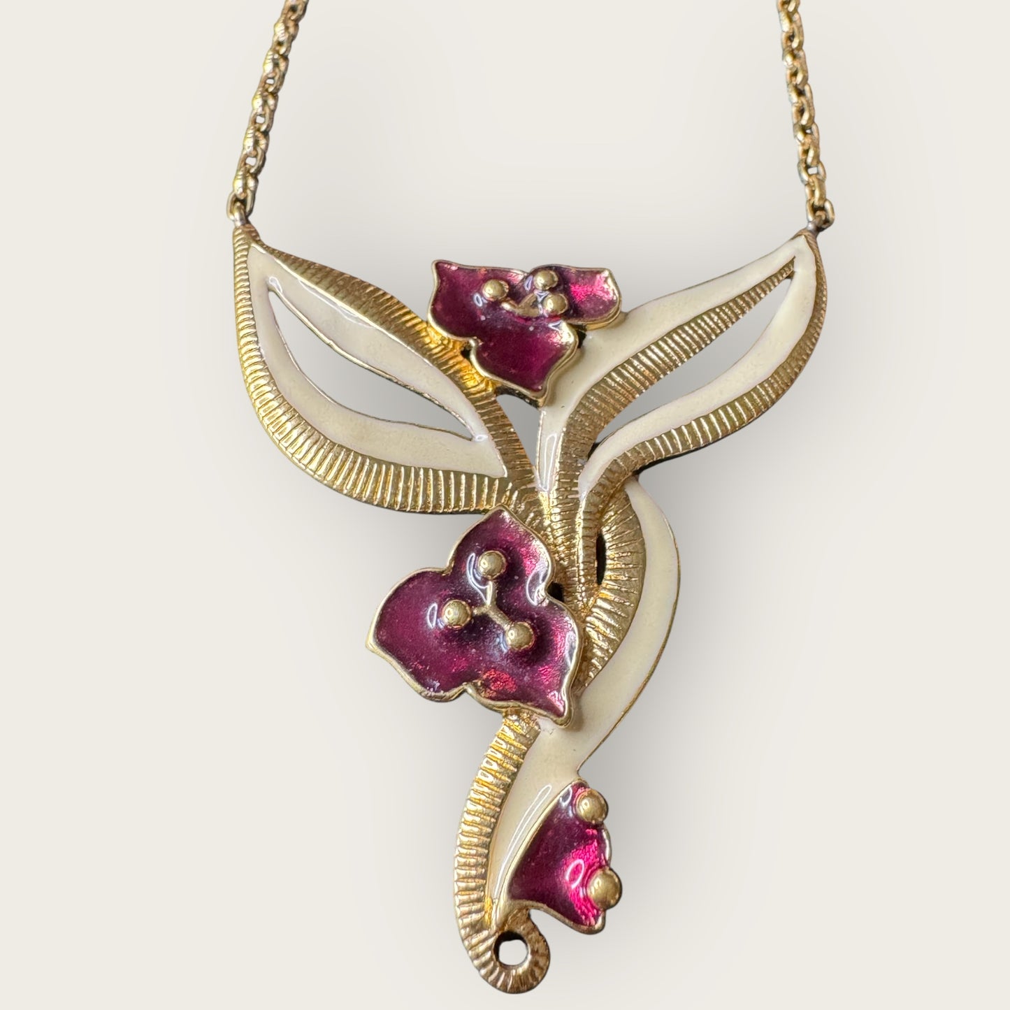 Vintage Signed Monet Floral Enamel Necklace – Gold-Tone Abstract Lily Design with Deep Magenta Accents