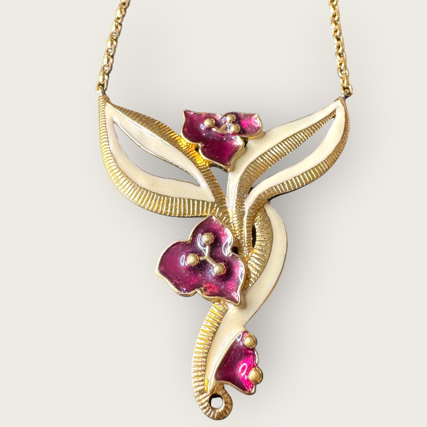 Vintage Signed Monet Floral Enamel Necklace – Gold-Tone Abstract Lily Design with Deep Magenta Accents