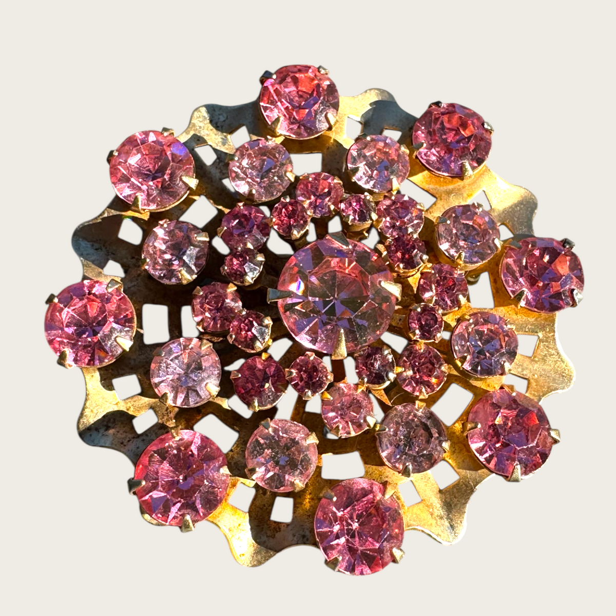 Vintage 1950s Pink Rhinestone Domed Starburst Brooch – Layered Openwork Gold Tone Statement Pin