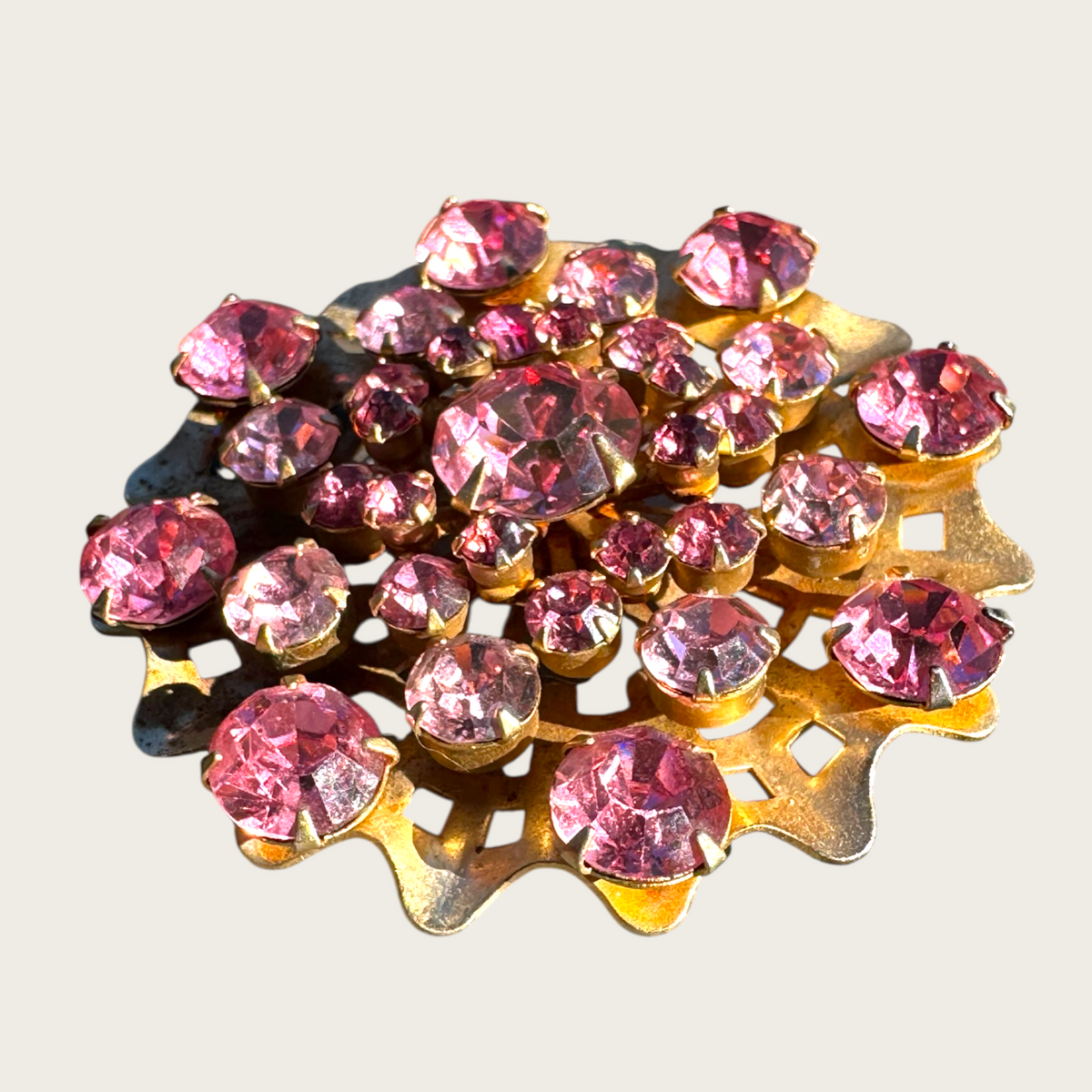 Vintage 1950s Pink Rhinestone Domed Starburst Brooch – Layered Openwork Gold Tone Statement Pin