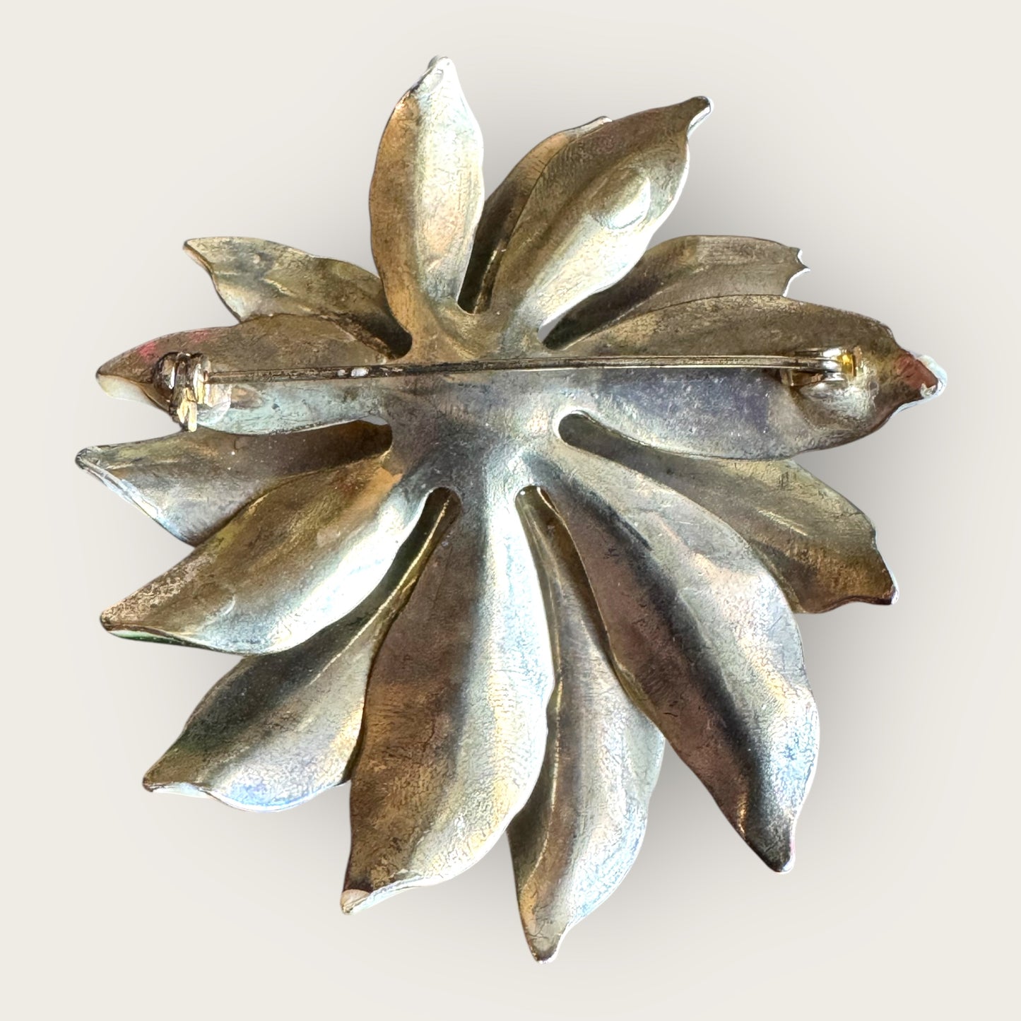 Vintage white poinsettia enamel brooch with green leaves and topaz rhinestone center – 1 inch holiday flower pin