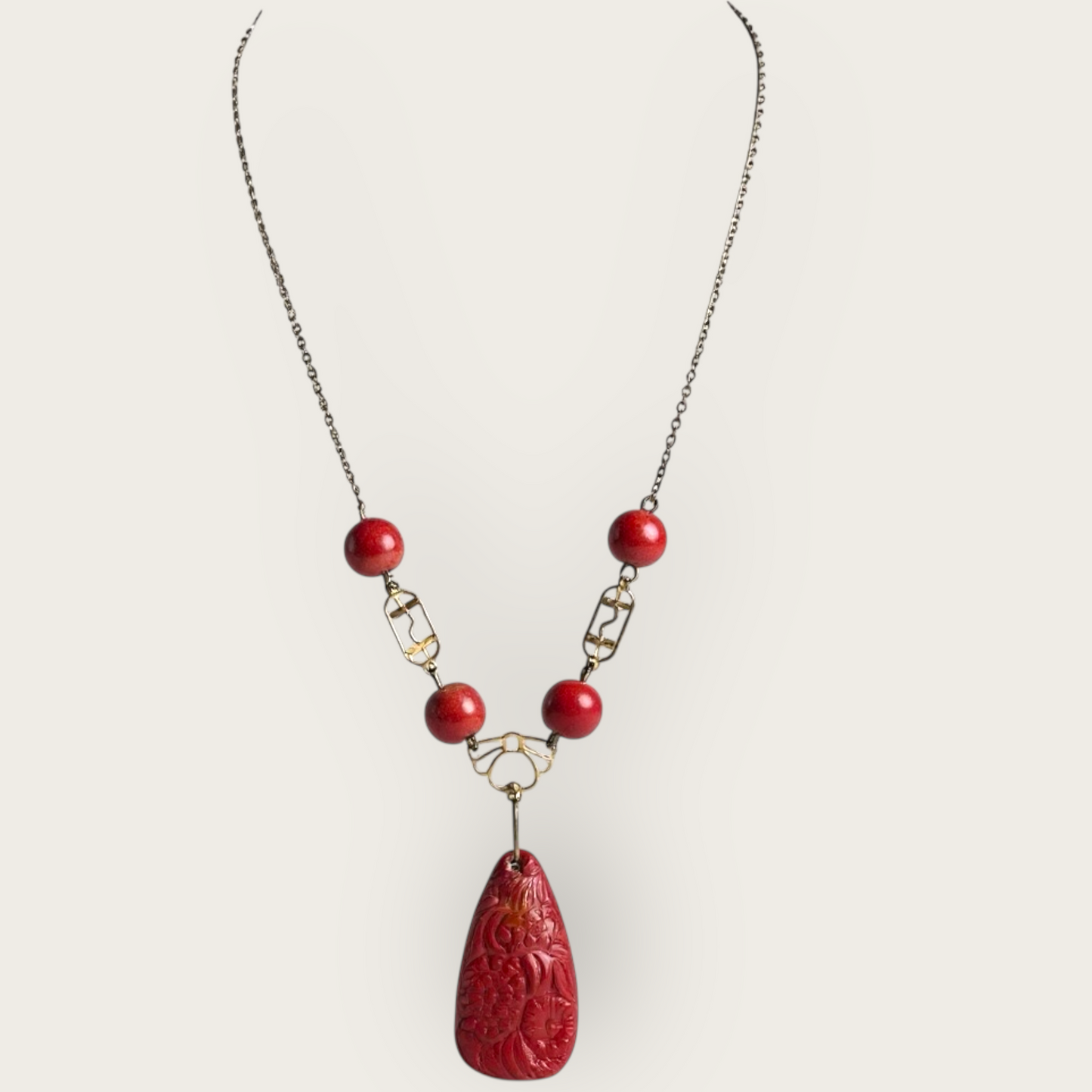 Vintage Asian-Inspired Carved Red Stone Pendant Necklace with Brass-Tone Chain and Glass Beads