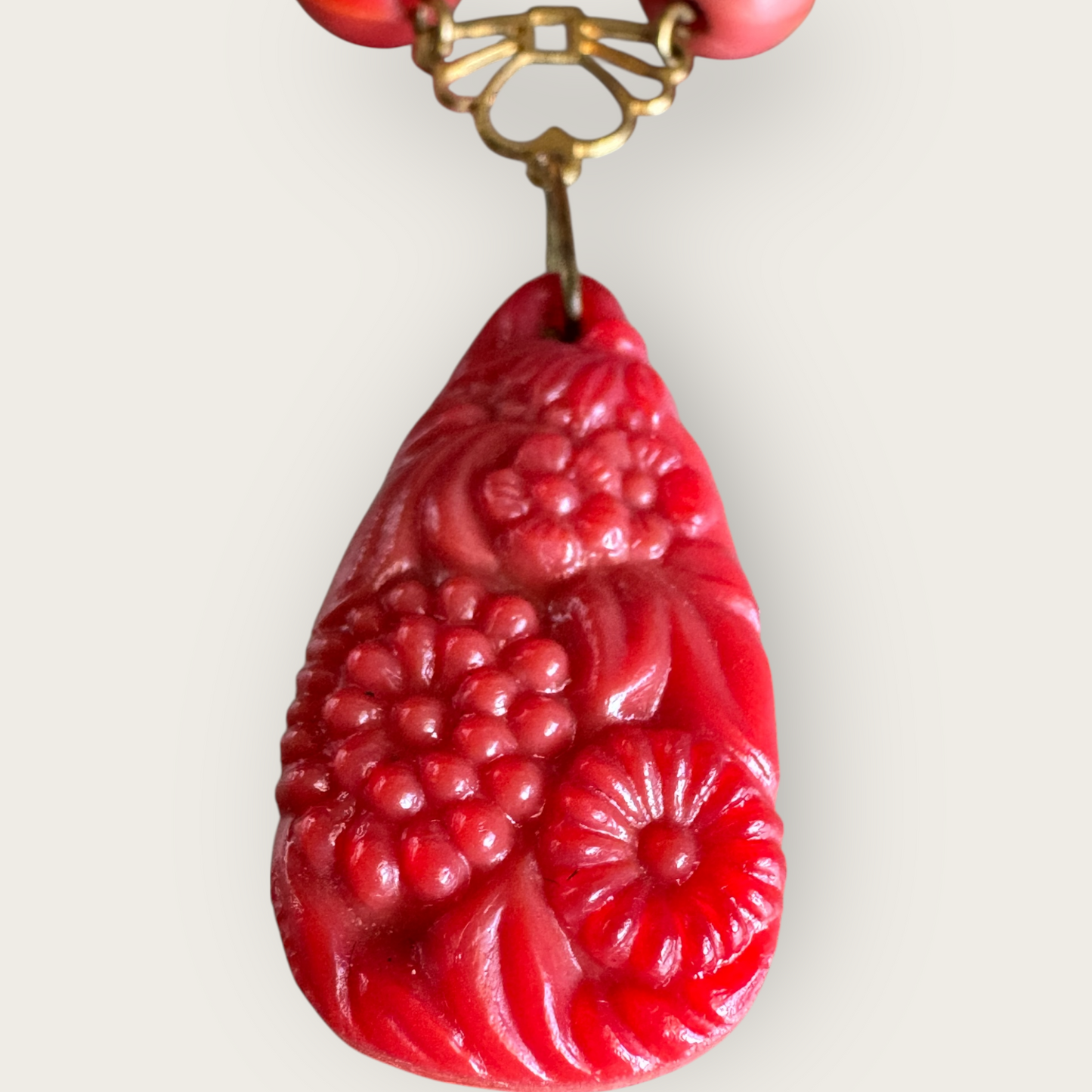 Vintage Asian-Inspired Carved Red Stone Pendant Necklace with Brass-Tone Chain and Glass Beads