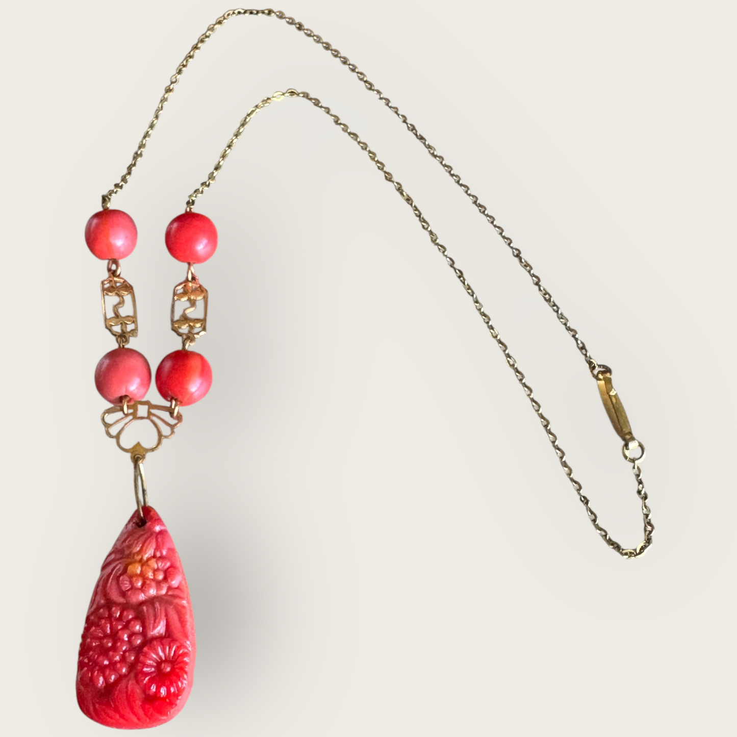Vintage Asian-Inspired Carved Red Stone Pendant Necklace with Brass-Tone Chain and Glass Beads