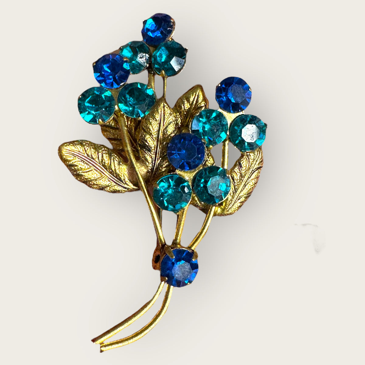 Vintage Austrian-Style Blue & Teal Rhinestone Floral Brooch – Mid-Century Bouquet Pin, Gold-Tone, 1950s–60s
