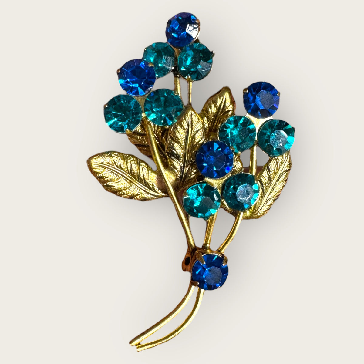 Vintage Austrian-Style Blue & Teal Rhinestone Floral Brooch – Mid-Century Bouquet Pin, Gold-Tone, 1950s–60s