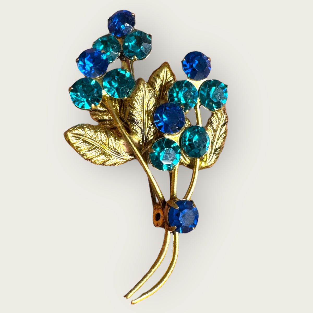 Vintage Austrian-Style Blue & Teal Rhinestone Floral Brooch – Mid-Century Bouquet Pin, Gold-Tone, 1950s–60s