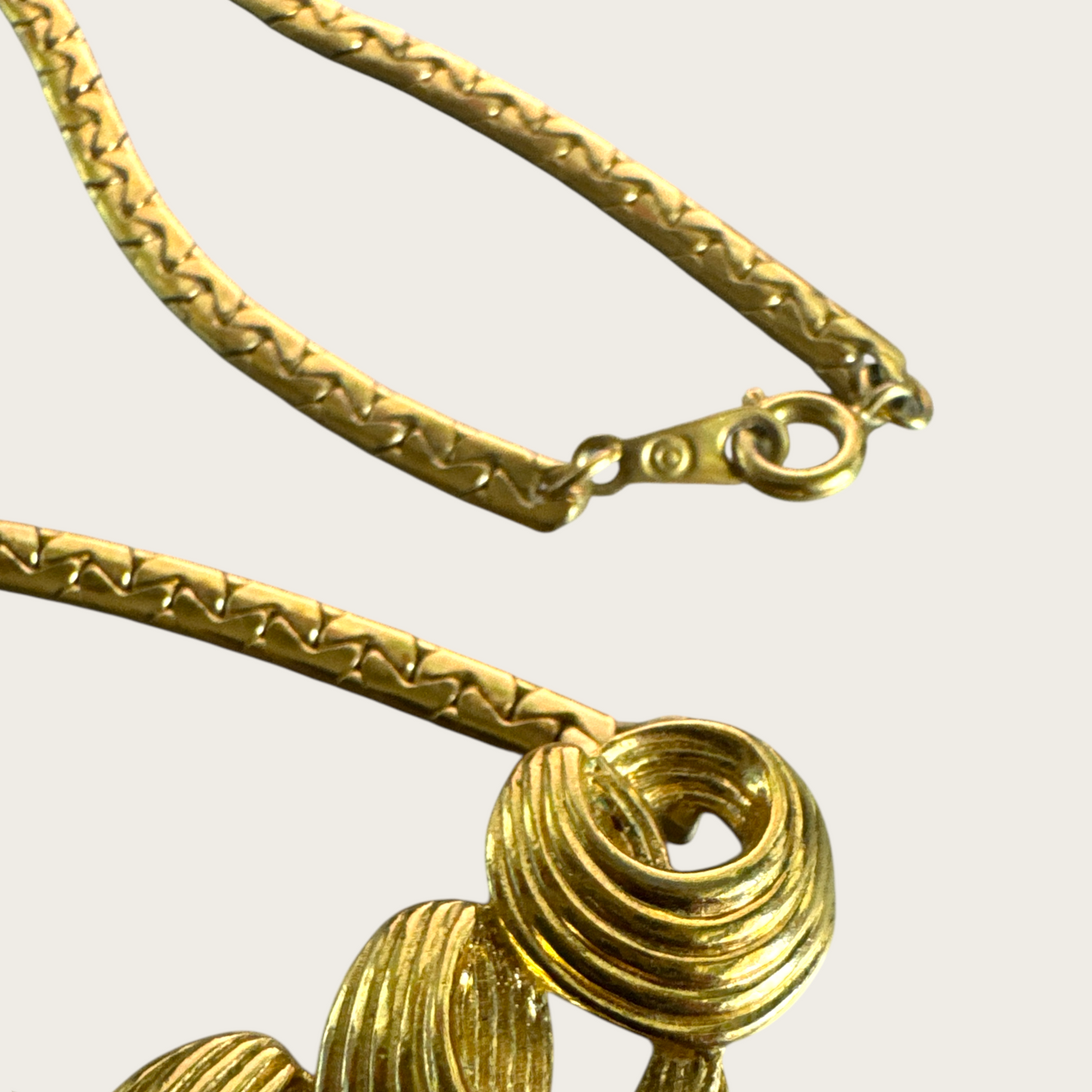 Vintage Monet Gold-Tone Swirl Bar Necklace – 1980s Statement Jewelry