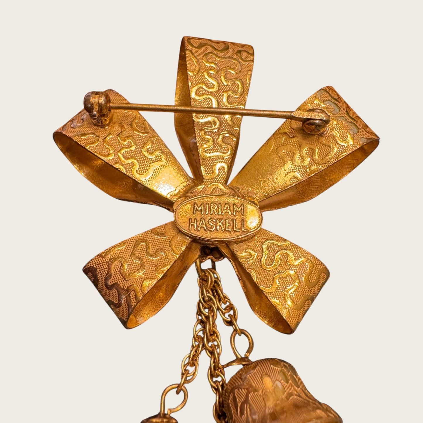 Miriam Haskell Gold Bow & Dangling Bell Brooch – Signed Vintage