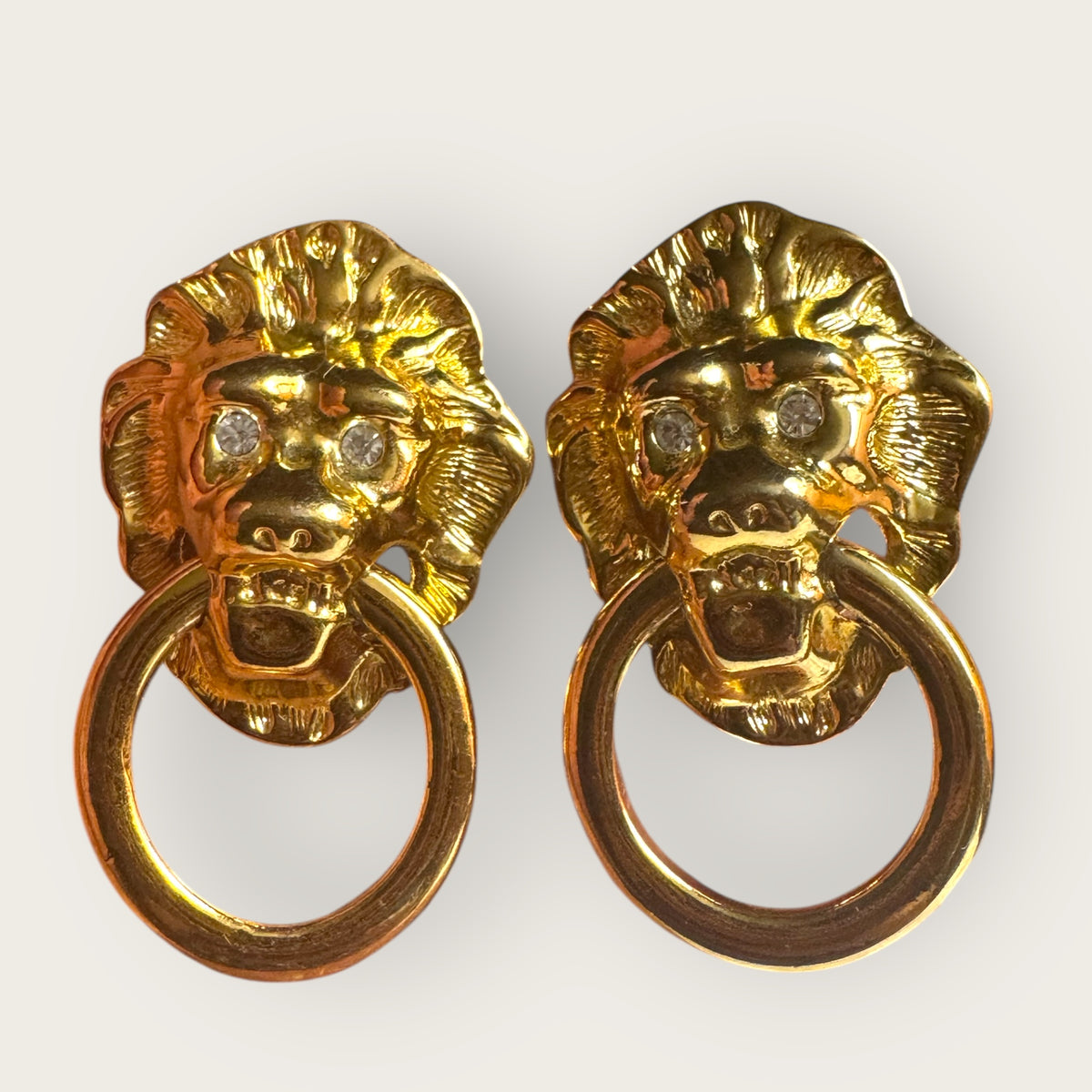 Vintage KJL for Avon Lionhead Door Knocker Earrings – Gold Tone Clip-On Statement Jewelry with Rhinestone Eyes