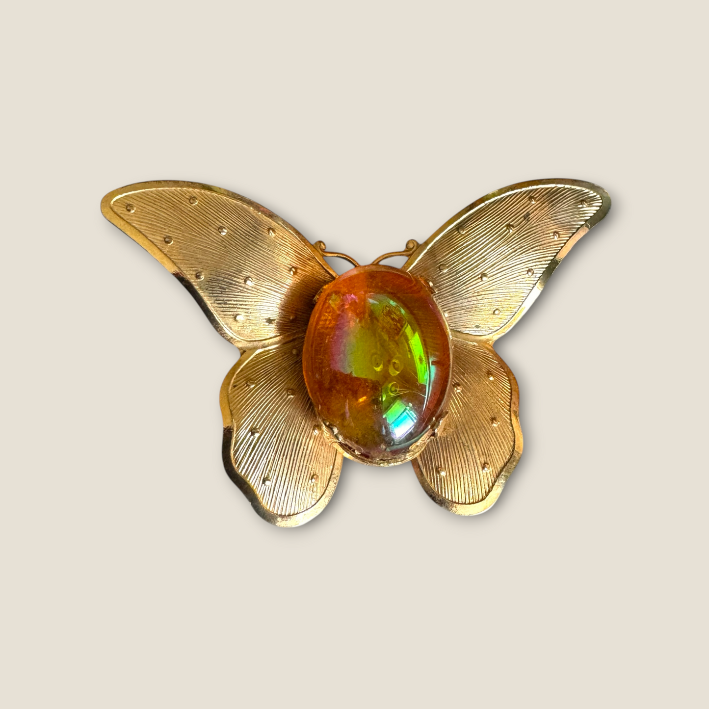 Vintage Iridescent Glass Butterfly Brooch – Domed Cabochon on Gold-Tone Wings