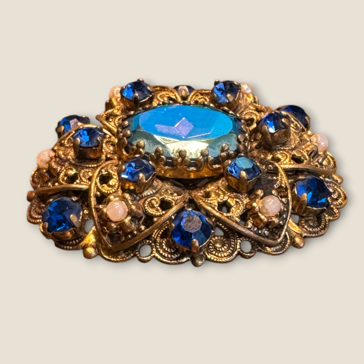 Vintage 1930s Germany Brass Filigree Brooch with Blue Rhinestones and Faux Pearls – Ornate Pre-War Pin