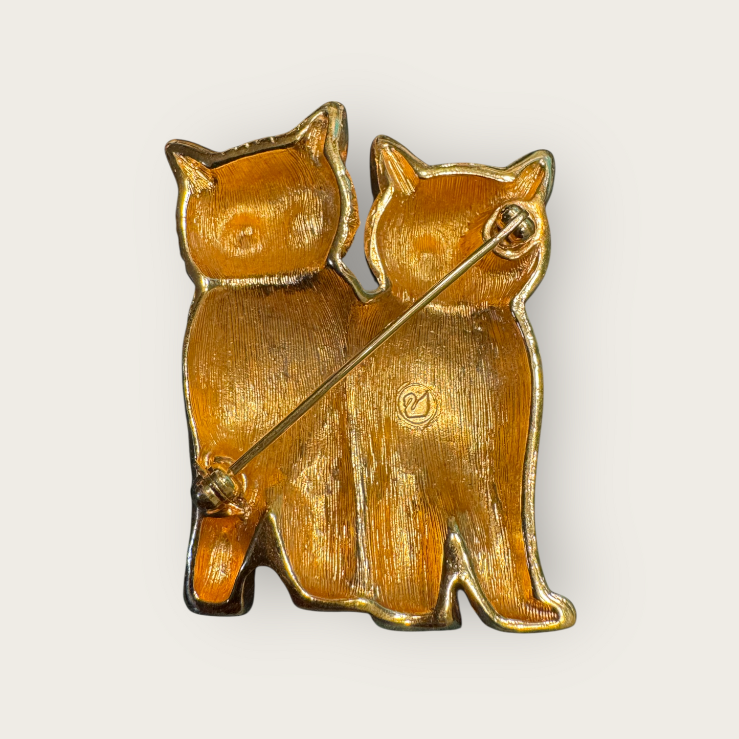 Vintage Swarovski Dual Cats Brooch – Black Enamel & Brushed Gold Tone with Emerald Crystal Eyes (c. 1980s–1990s)