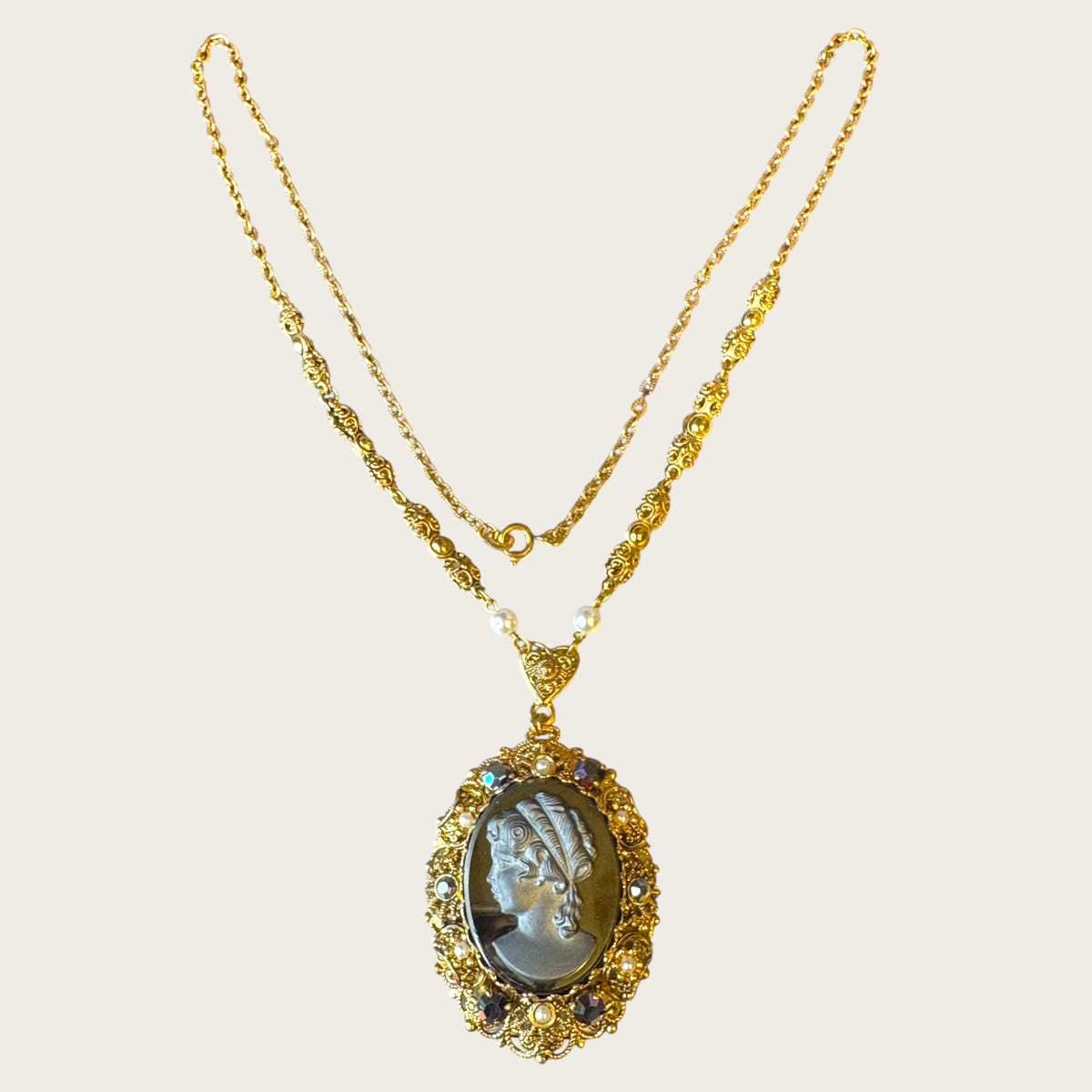Vintage West Germany Hematite Glass Cameo Pendant Necklace – Ornate Filigree Frame with Pearls & Faceted Stones – Signed 1960s