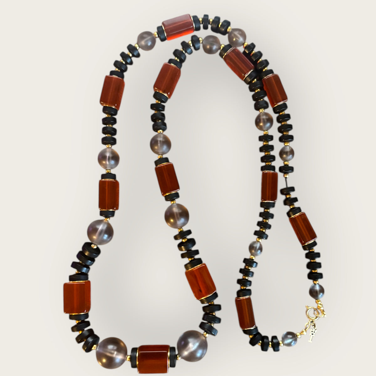 Vintage Crown Trifari Amber Lucite & Smoky Bead Long Necklace – Graduated Bead Design, Key Hangtag
