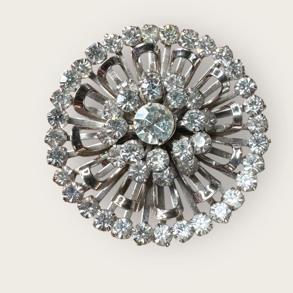Mid-Century Layered Clear Rhinestone Burst Brooch – Silvertone Radiance