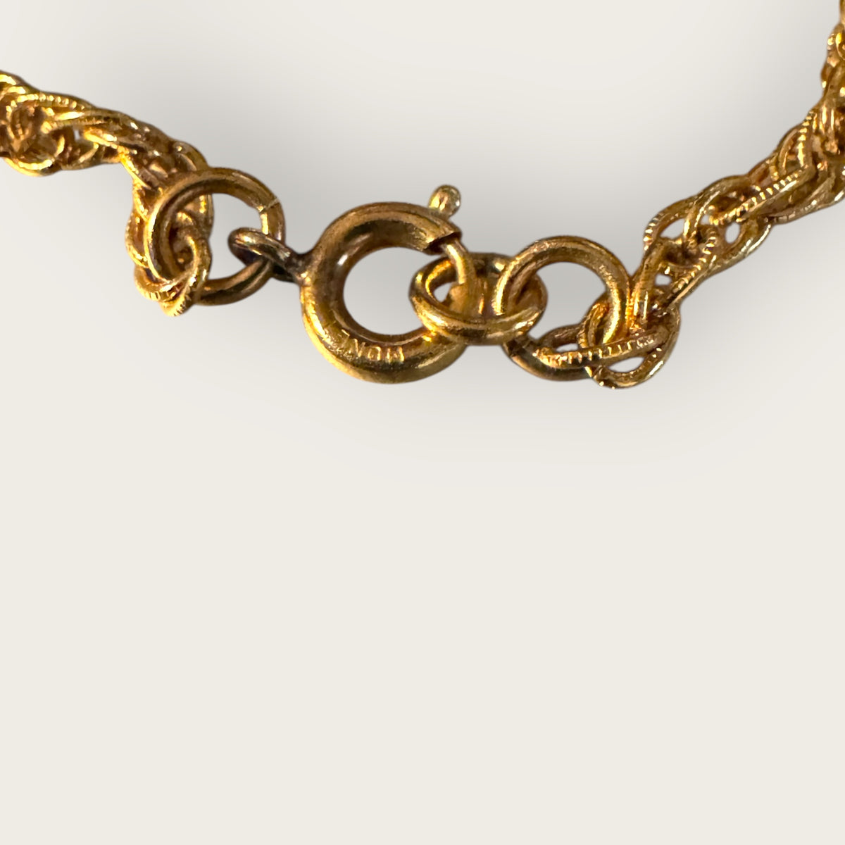 Vintage 1975 Monet “Felice” Statement Pendant Necklace – Gold-Tone Textured Scrollwork | Book Piece