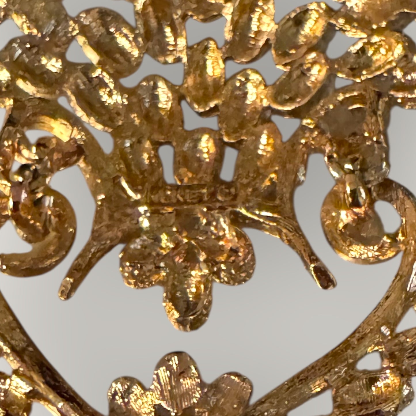 Vintage 1975 Monet “Felice” Statement Pendant Necklace – Gold-Tone Textured Scrollwork | Book Piece