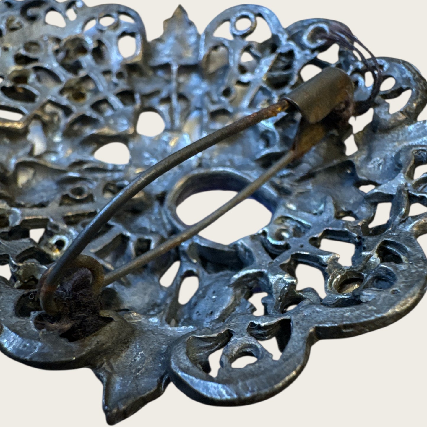 Antique Victorian Bohemian Filigree Brooch with Blue Rhinestones & Purple Center Cabochon – Hand-Repaired Heirloom, c. 1890–1910