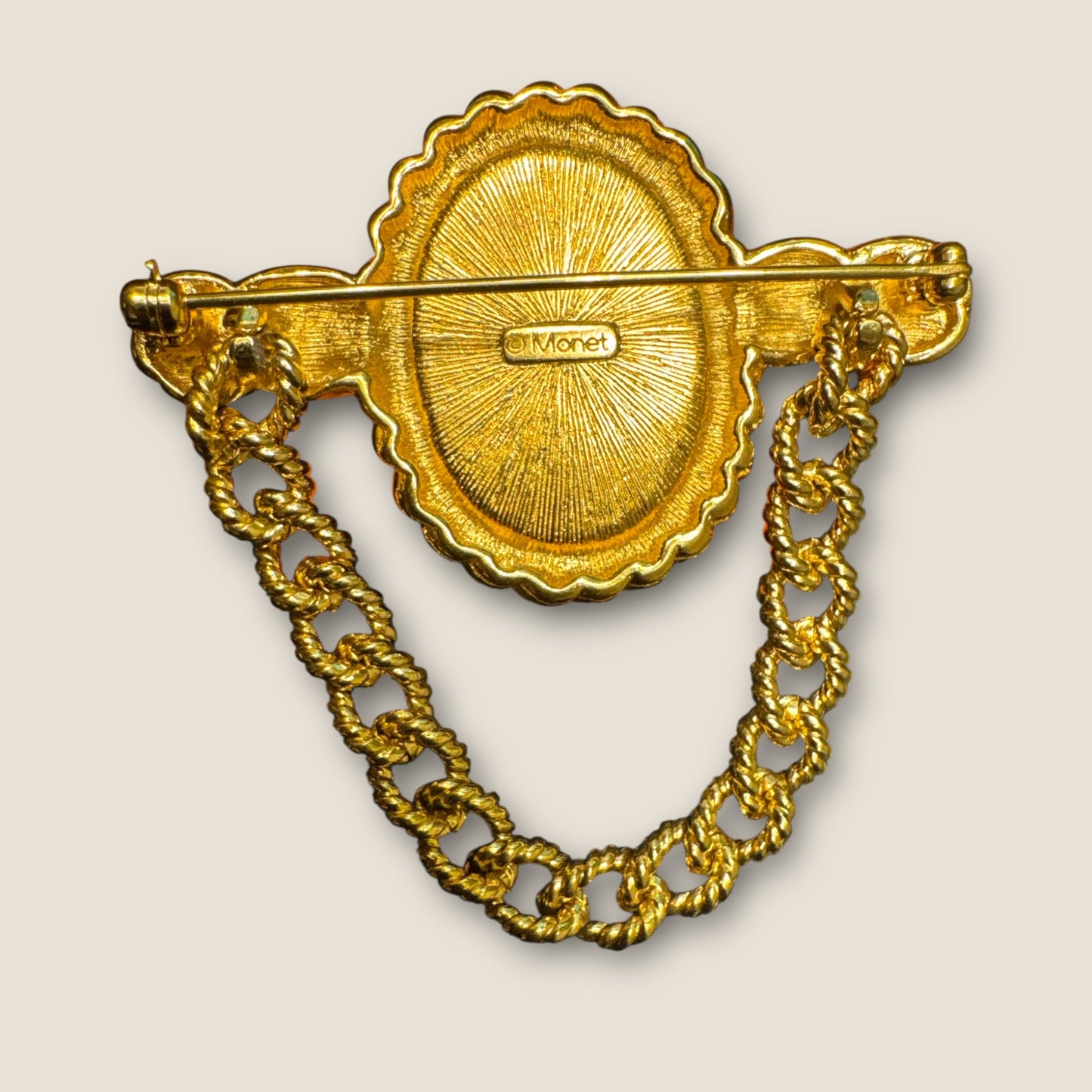 Vintage MONET Gold-Tone Chain Swag Brooch with White Lucite Cabochon