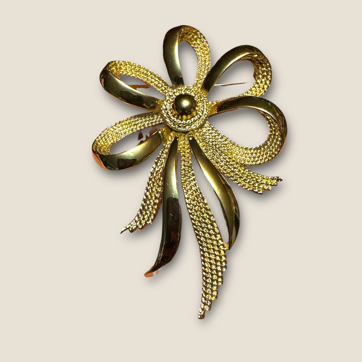 Vintage Monet Gold-Tone Ribbon Statement Brooch – Sculptural Textured Bow Pin