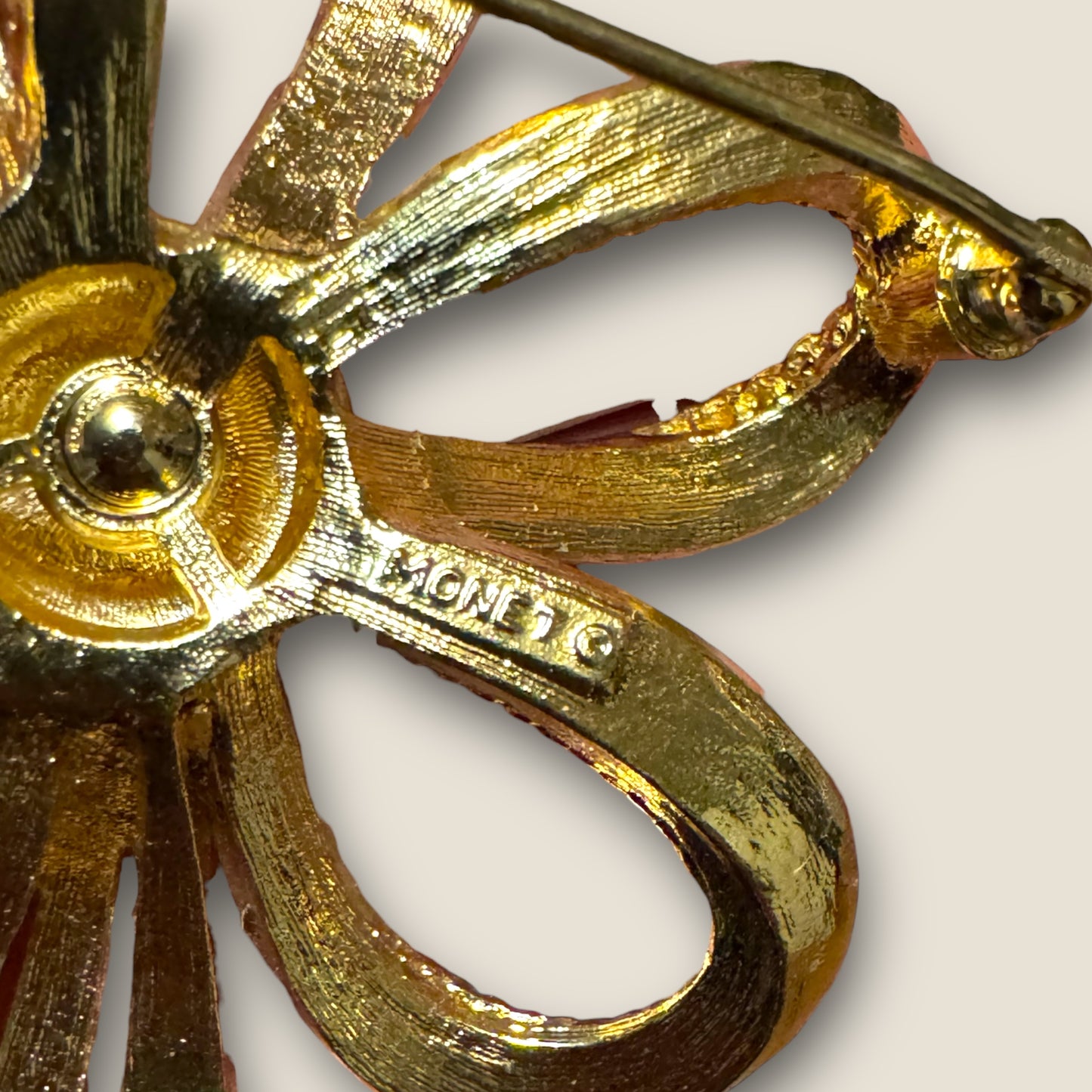 Vintage Monet Gold-Tone Ribbon Statement Brooch – Sculptural Textured Bow Pin