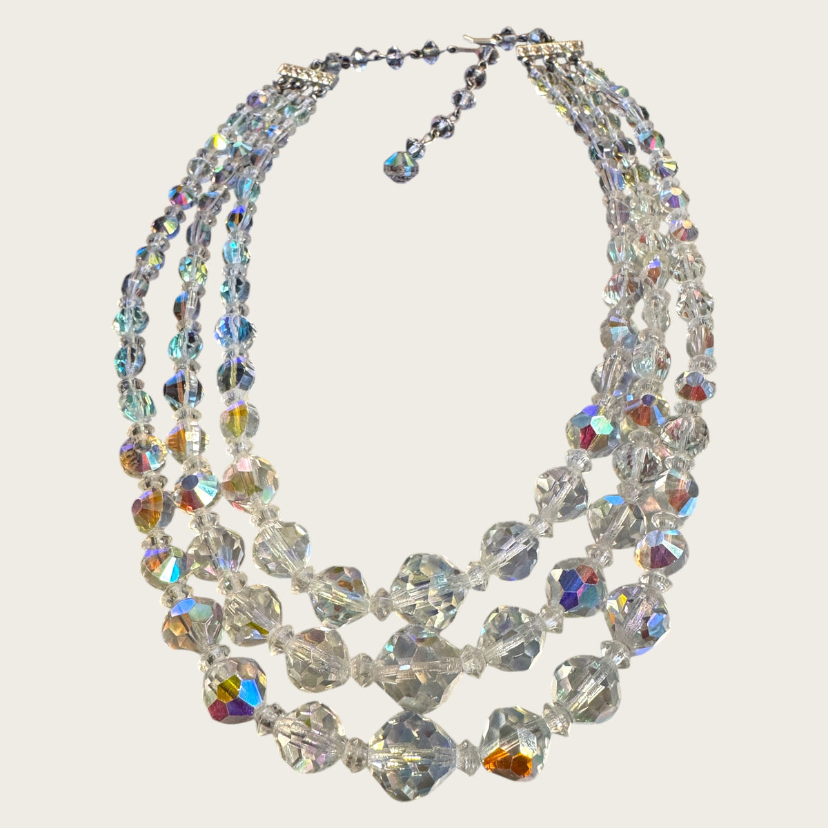 Vintage Aurora Borealis Triple-Strand Crystal Necklace – Faceted Rounds + Bicone Beads, Rhinestone Bar Clasp (1950s–1960s)