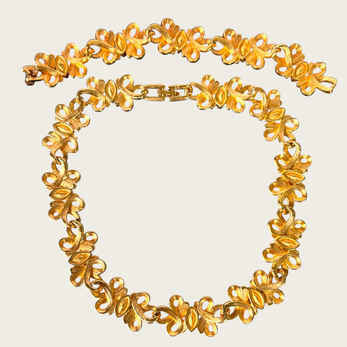 Swarovski Swan Signed Multicolor Navette Scroll Parure, 1990s Gold Tone Choker & Bracelet Set