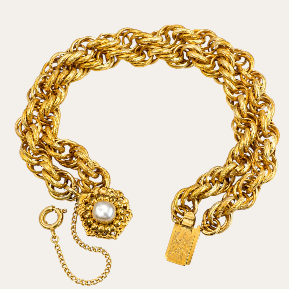 Vintage Miriam Haskell Double Rope Gold-Tone Bracelet with Pearl Floral Clasp – Signed