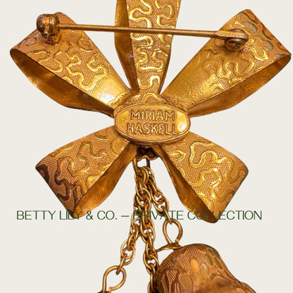 Miriam Haskell Gold Bow & Dangling Bell Brooch – Signed Vintage (Book Piece) | Private Collection