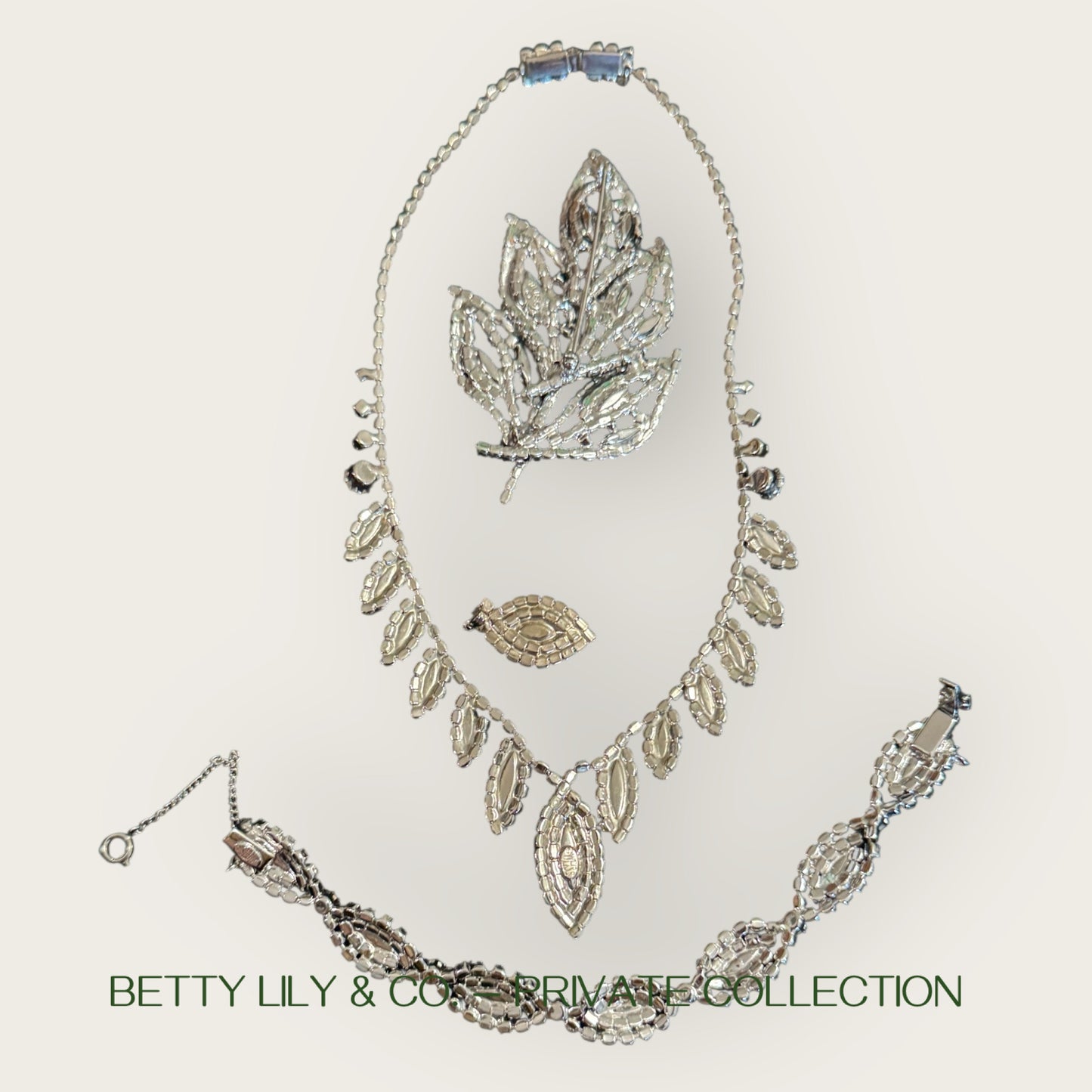 Signed Weiss Emerald Green Navette Rhinestone Parure | Necklace, Bracelet & Brooch | Mid-Century Collector’s Masterpiece | Private Collection