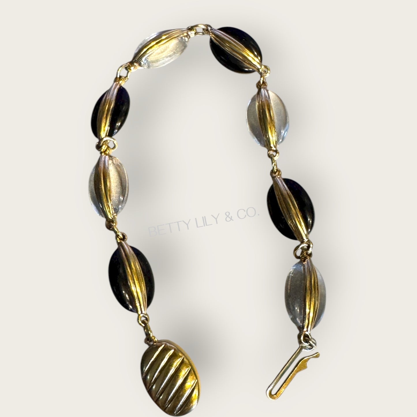 Vintage Swarovski Dove-Marked Crystal Cabochon Bracelet – Jet & Clear, Ribbed Gold Wrap Links