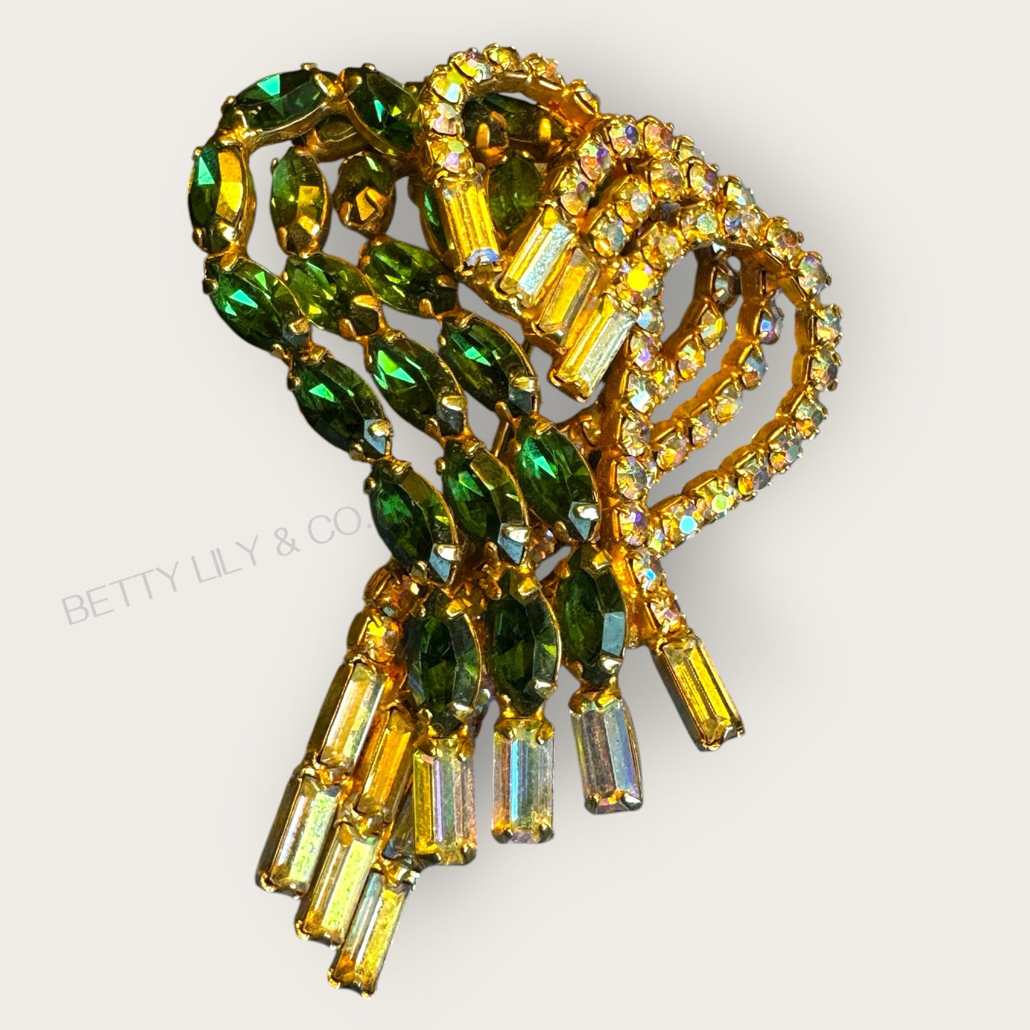 Mid-Century Emerald & Aurora Borealis Rhinestone Swirl Brooch – Unsigned Hobé Style