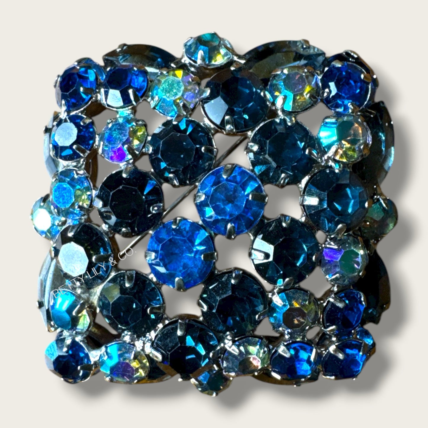 Vintage 1960s Sapphire Blue Aurora Borealis Domed Rhinestone Brooch – Layered Mid-Century Statement Pin in Silver-Tone