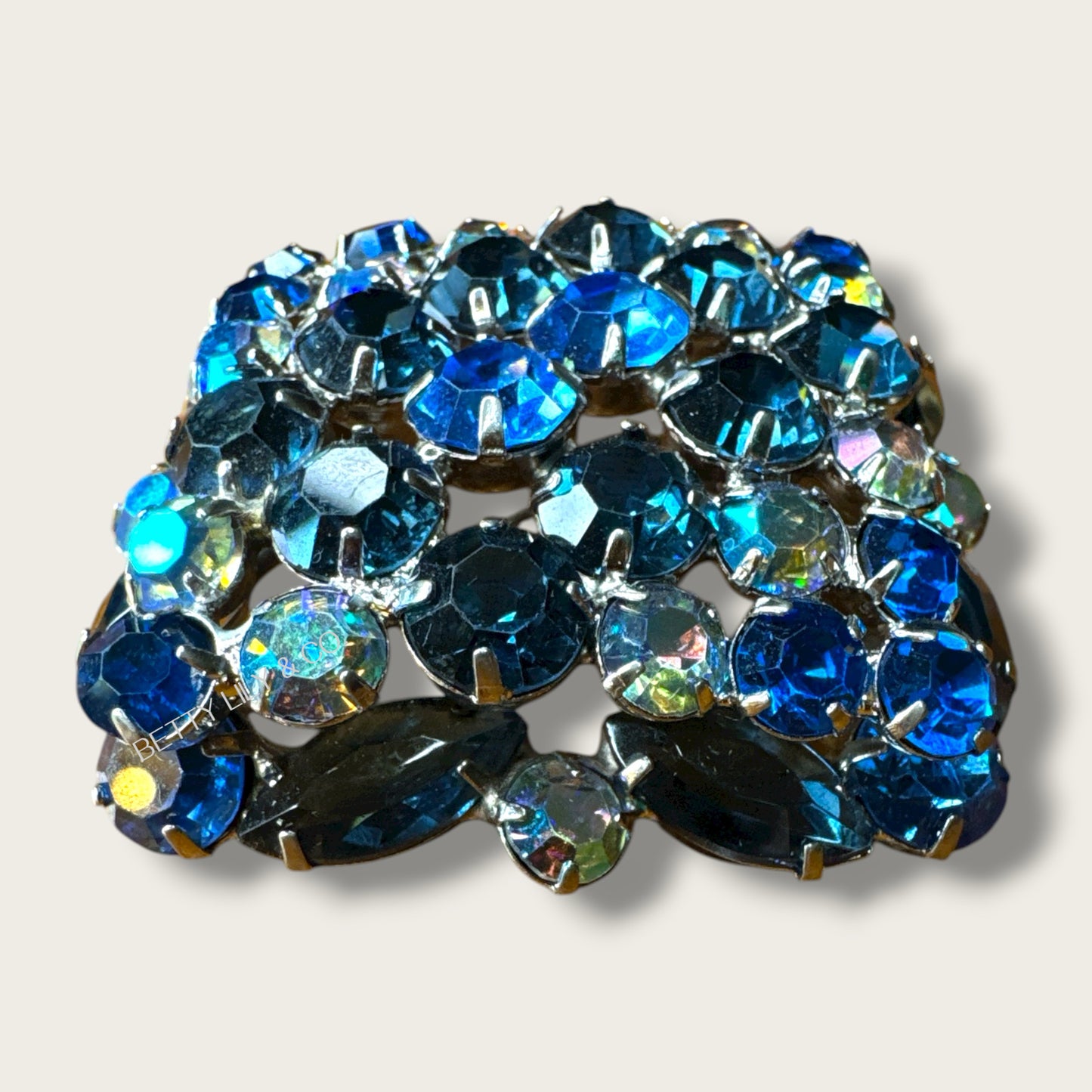 Vintage 1960s Sapphire Blue Aurora Borealis Domed Rhinestone Brooch – Layered Mid-Century Statement Pin in Silver-Tone