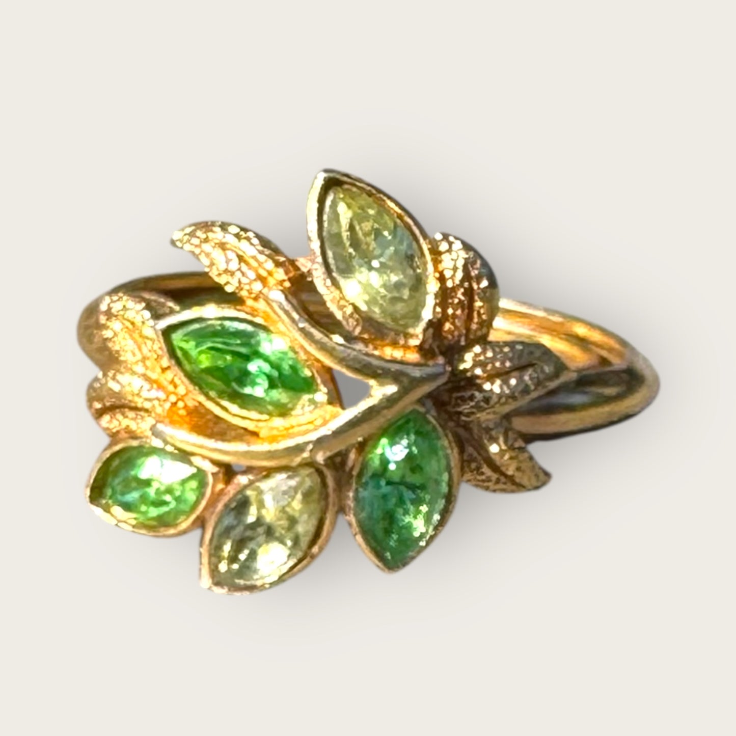 Vintage Signed Avon Gold Tone Leaf Ring with Peridot Marquise Stones and Uranium Glass
