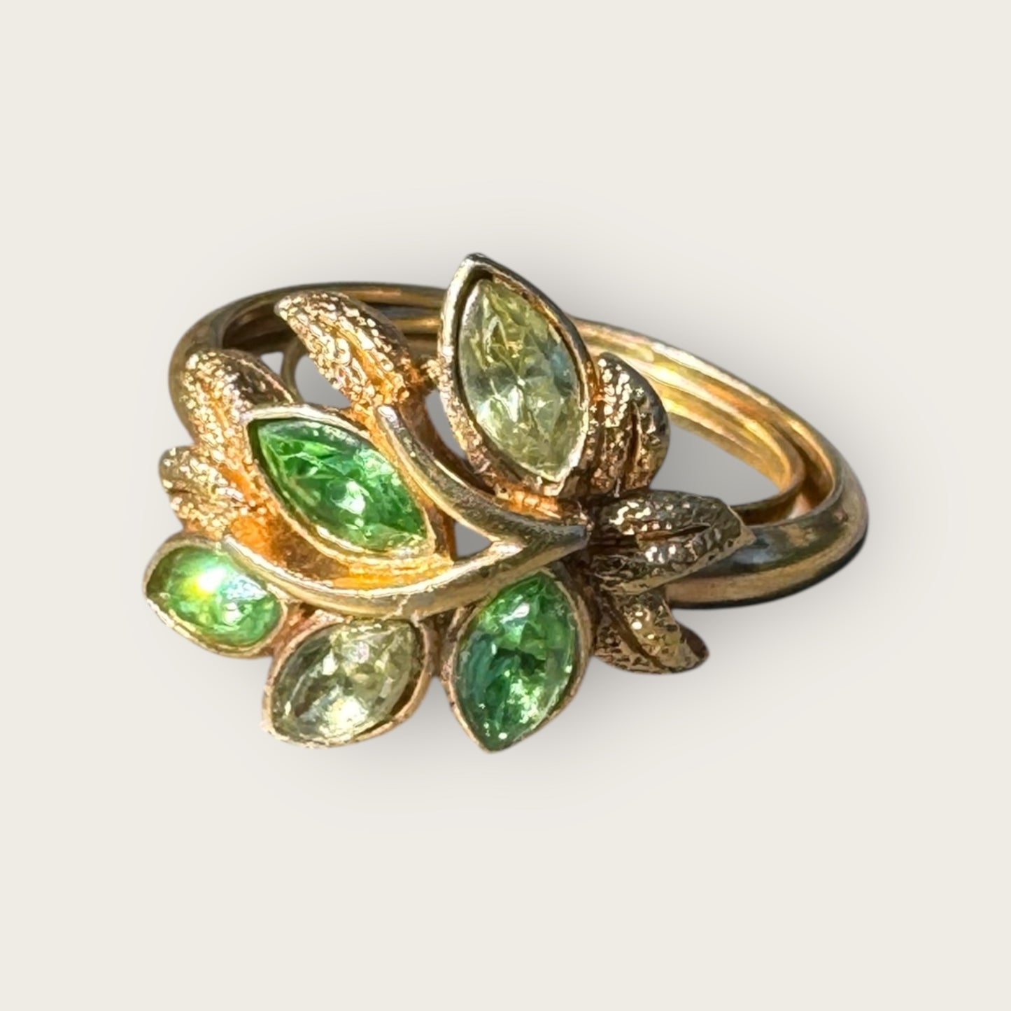 Vintage Signed Avon Gold Tone Leaf Ring with Peridot Marquise Stones and Uranium Glass